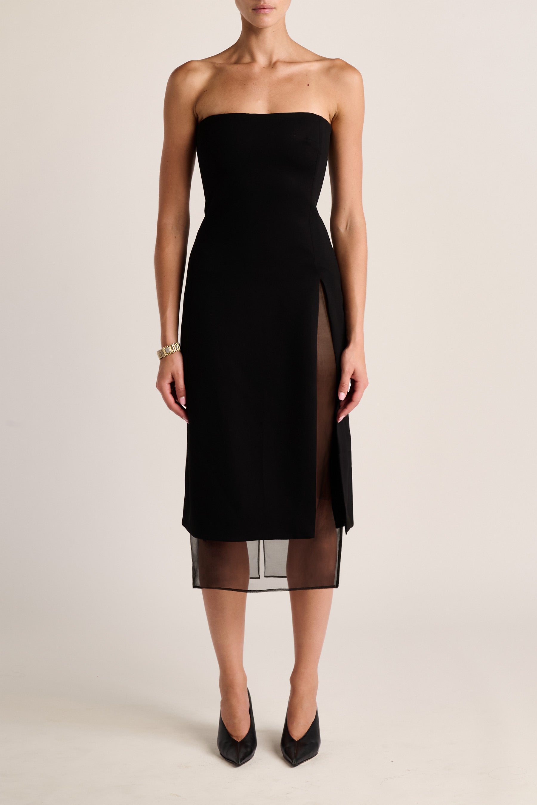 strapless tailored midi dress STRAPLESS TAILORED MIDI DRESS: CRAFTED FROM WOOL WITH HIGH TAILORING, FEATURING A PENCIL SKIRT WITH A SINGLE BACK SLIT, DESIGNED WITH EXTERNAL DARTS ALONG THE WAIST TO ENHANCE THE FIT AROUND YOUR
